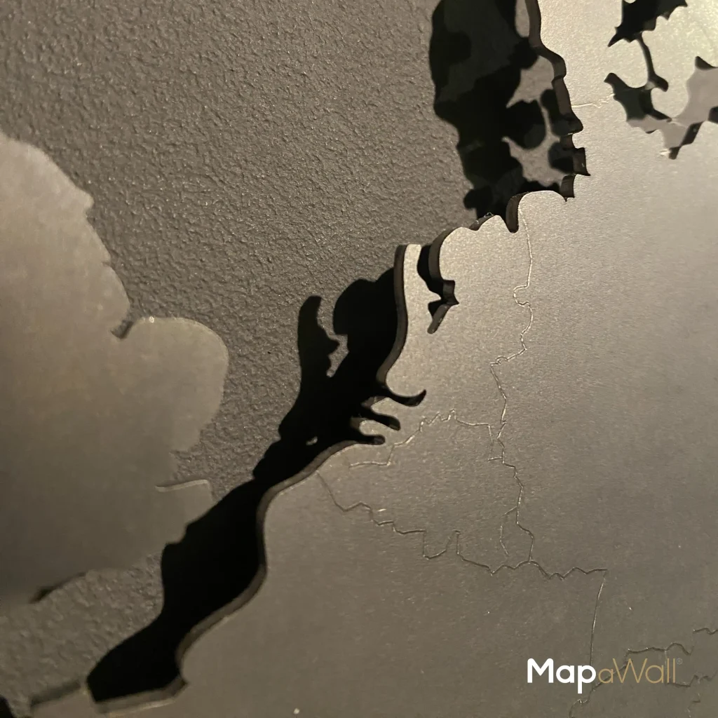 Close-up photo of a corten steel world map