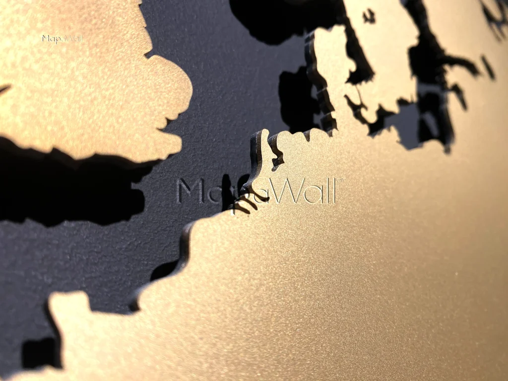 Close-up photo of the brass world map